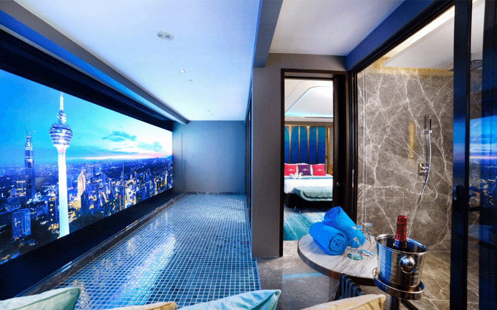 Stunning night view of the illuminated Royal Lexis tower defining the KLCC skyline